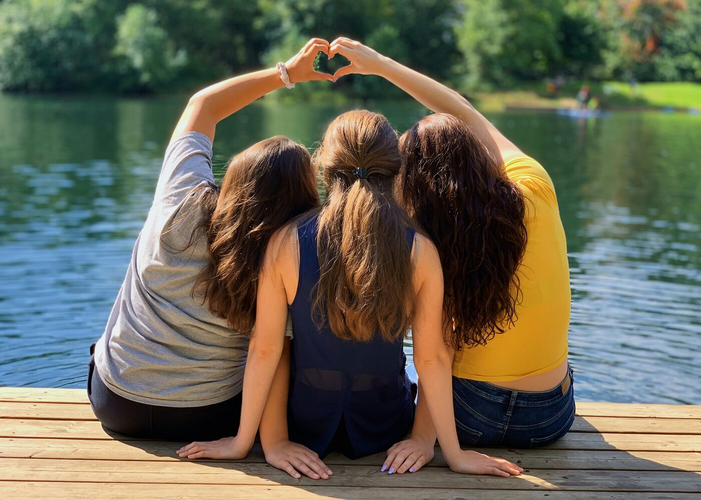 Friends gathered on a lake dock